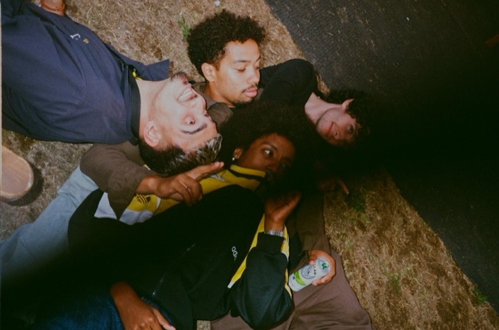 Friends lying on the ground, shot from above